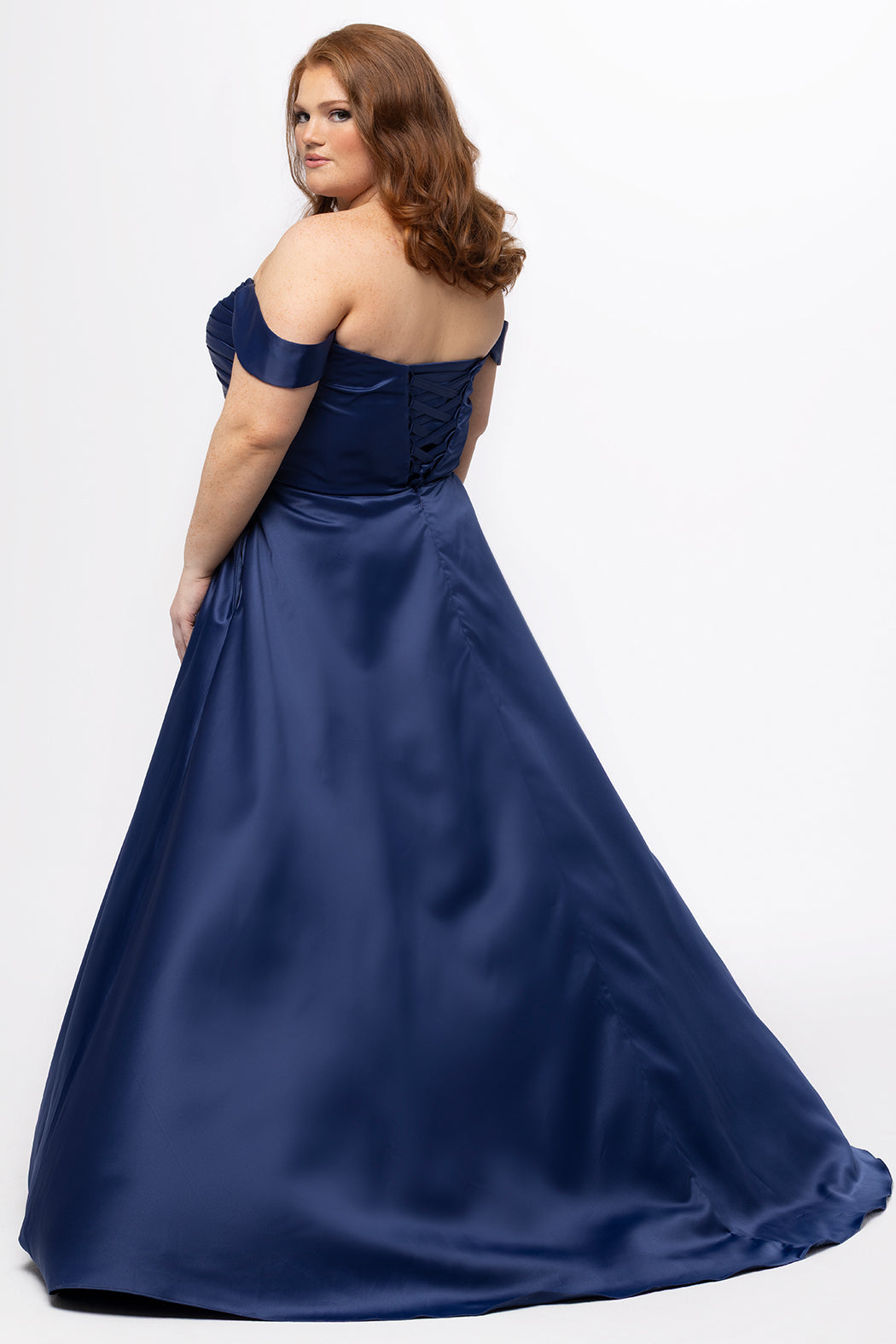 Plus Size Prom & Formal dress by Sydney's Closet - Style SC7431 shown in Navy. 

A-line silhouette, sweetheart neckline with pleated bust and knot details, detachable off the shoulder straps, natural waistline, A-line skirt with pocket and sexy slit with founce ruffle detail. 