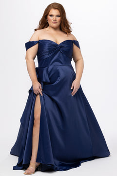 Plus Size Prom & Formal dress by Sydney's Closet - Style SC7431 shown in Navy. 

A-line silhouette, sweetheart neckline with pleated bust and knot details, detachable off the shoulder straps, natural waistline, A-line skirt with pocket and sexy slit with founce ruffle detail. 