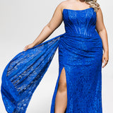 Plus size lace slim fitted dress featuring stretch lace with tone-on-tone hot fix stones.  Cateye bodice, exposed corset boning, assymetrical waistline with detachable drape scarf, ruched skirt with high slit and sweep train.  Sydney's Closet style SC7432 in Cobalt Blue.