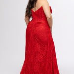 Plus size lace slim fitted dress featuring stretch lace with tone-on-tone hot fix stones.  Cateye bodice, exposed corset boning, assymetrical waistline with detachable drape scarf, ruched skirt with high slit and sweep train.  Sydney's Closet style SC7432 in Ruby Red.