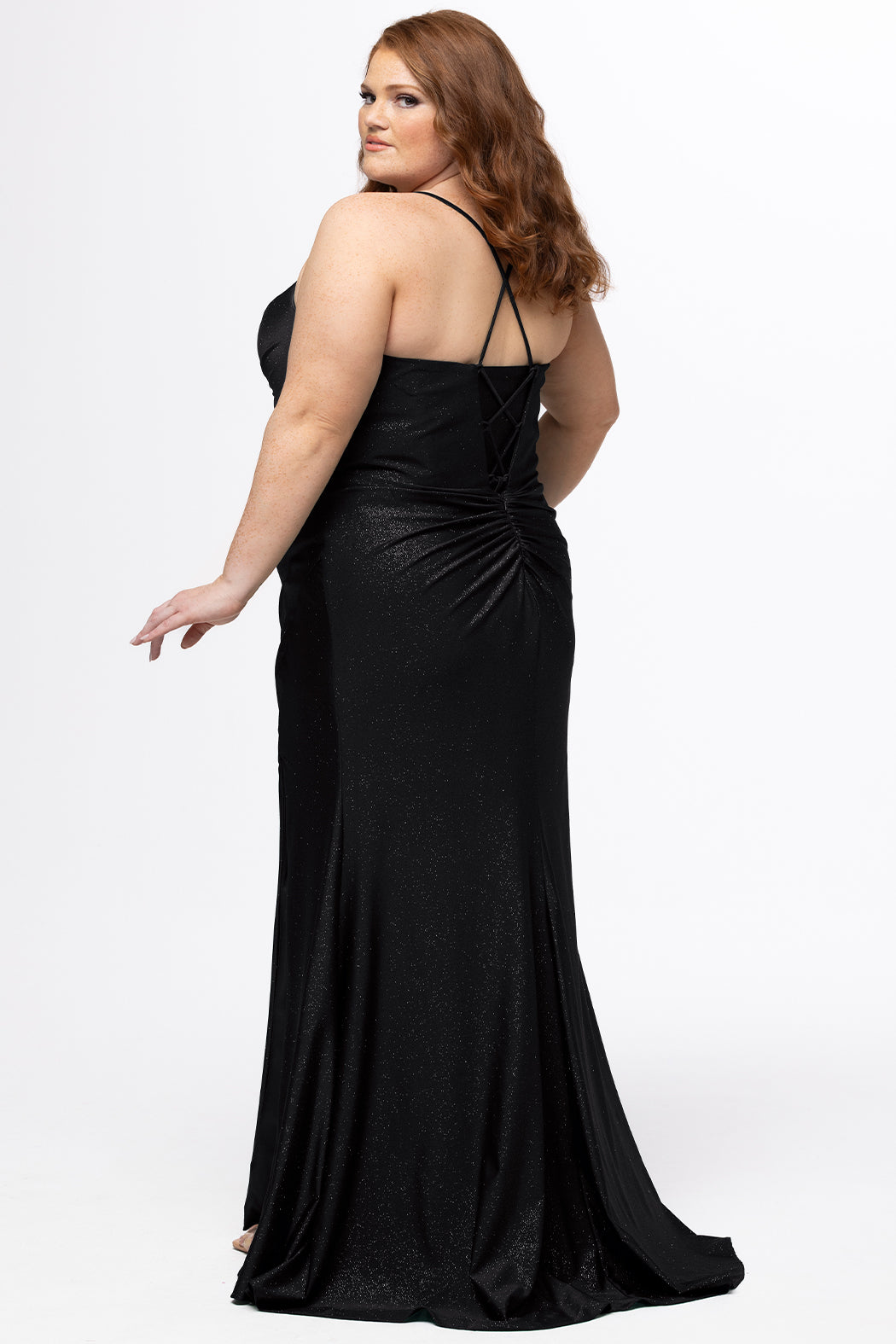 Sydney's Closet style SC7434 in Onyx Black. 

Slim, fitted silhouette, sweeetheart neckline, pleated bodice, anutral waistline, ruched skirt with left leg slit, sweep train and spaghetti straps that criss-cross in the back and go into the lace up back with modesty panel. 