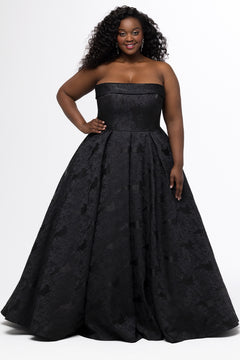 Sydney's Closet style SC7439 in black floral brocade.

A-line silhouette, strapless neckline with fold over cuff detail, natural waistline, full a-line skirt with box pleats, crinoline and pockets.