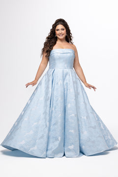 Sydney's Closet style SC7439 in light blue floral brocade.

A-line silhouette, strapless neckline with fold over cuff detail, natural waistline, full a-line skirt with box pleats, crinoline and pockets.