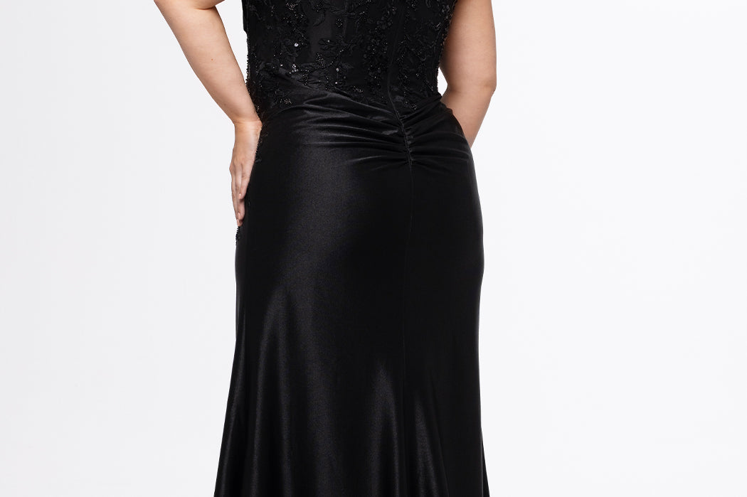 Sydney;s Closet style SC7441 in black.

Slim, fitted silhouette with strapless sweetheart neckline and pleated drape detaile.  Exposed corset boning, basque waistline and slim skirt with ruching, high slit and sweep train.  

Bodice features tone-on-tone lace with tone-on-tone beading that carries into the top of the slit.