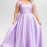 Sydney's Closet style SC7444 in lilac

A-line silhouette, square neckline with wide straps and detachable bows at high point of shoulder. Natural waistline, full A-line skirt with pockets and crinoline. 