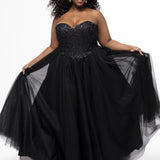 Sydney's Closet style SC7450 in black.

Ball gown silhouette, strapless bodice with deep V-mesh insert covered in lace appliques and exposed corset boning. Basque waistline and full sparkle tulle a-line skirt. Lace up back with modesty panel. 