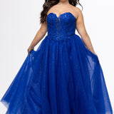 Sydney's Closet style SC7450 in royal blue.

Ball gown silhouette, strapless bodice with deep V-mesh insert covered in lace appliques and exposed corset boning. Basque waistline and full sparkle tulle a-line skirt. Lace up back with modesty panel. 