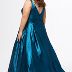 Sydney's Closet Style SC7453 in Electric Blue

Plus Size A-line prom dress in metallic shimmer knit fabric, V-neckline with nude mesh insert, bra-friendly straps, pleated bodice, natural waisltine, A-line skirt with box pleats, pockets and a horsehair hem.