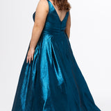 Sydney's Closet Style SC7453 in Electric Blue

Plus Size A-line prom dress in metallic shimmer knit fabric, V-neckline with nude mesh insert, bra-friendly straps, pleated bodice, natural waisltine, A-line skirt with box pleats, pockets and a horsehair hem.