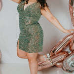 Sydney's Closet Plus Size Homecoming Short Party Dress SC8110 - Slim, fitted silhouette with pleate bodice, bra-friendly straps, fitted skirt and slit. Available in green sequins