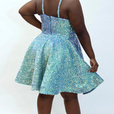 This is SC8125 in our Sydney's Closet Homecoming collection. This plus size party dress comes in blue and green! This dress has spaghetti straps, a scooped neckline, and a natural waistline! This a-line quilted sequin gown has a horsehair hem that flows beautifully with your dance moves! To make this gown perfect, we have added pockets which is why you need it for this homecoming season!