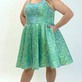 This is SC8125 in our Sydney's Closet Homecoming collection. This plus size party dress comes in blue and green! This dress has spaghetti straps, a scooped neckline, and a natural waistline! This a-line quilted sequin gown has a horsehair hem that flows beautifully with your dance moves! To make this gown perfect, we have added pockets which is why you need it for this homecoming season!