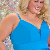 This is SC8126 in our Sydney's Closet Homecoming collection. This plus size party dress comes in blue and coral! This dress has spaghetti straps and a v-neckline with a mesh insert to match the color of the dress! This a-line satin gown flows beautifully with your dance moves! To make this gown perfect, we have added pockets which is why you need it for this homecoming season!