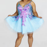 This is SC8134 in our Sydney's Closet Homecoming collection. This plus size party dress comes in blue, pink, and light blue! This dress has straps covered in sequins and a scoop back. This a-line dress has sequin on top of the glitter tulle and a satin lining! This gown will bring on the sparkle which makes it the most perfect for this homecoming season!