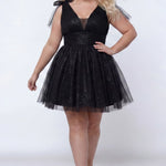 Short A-line plus size flowy party dress SC8153 by Sydney's Closet in the color Onyx black. Front view. Layers of dense sparkle tulle and a satin lining. V-neckline with thick bra-friendly straps and detachable bows at the top of the shoulder. Pleated bodice and 3 inch pleated waistband. Pockets and long invisible center back zipper. Available in Shamrock green, Admiral blue, Firecracker red and Shamrock green in sizes 14-32. Model is 5'9. 
