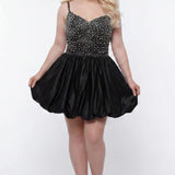 Plus-size model wearing a black sleeveless mini dress with a V-neckline, rhinestone & pearl embellished fitted bodice, and a voluminous bubble hem skirt. She is styled with long wavy blonde hair, dangling crystal earrings, and nude platform ankle-strap heels, posing against a light gray studio background while holding the sides of the skirt.

Sydney's Closet SC8171 in black