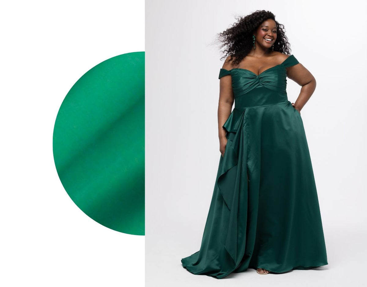 Woman wearing a green off-shoulder gown with a close-up of the fabric texture on a white background.