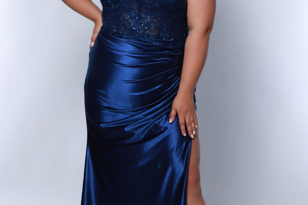 Tease Prom TE2413 Navy Ruched skirt into high slit with lace insert at top of slit, lace covered bodice with removable lining, double spaghetti straps.