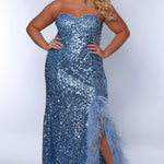 Tease Prom TE2419 Blue. Stretch sequin on net, Stretch knit lining, Sweetheart neckline, Strapless bodice, Natural waistline, Slim skirt with slit trimmed in Ostrich feathers, Sweep train.