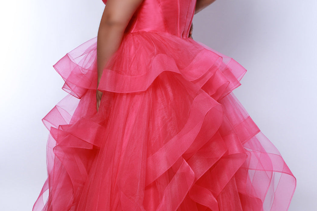 Tease prom TE2420 pink. Tulle ruffles on a tiered skirt, exposed boning on bodice, strapless, ballgown.