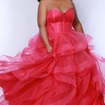 Tease prom TE2420 Pink. Tulle ruffles on a tiered skirt, exposed boning on bodice, strapless, ballgown.