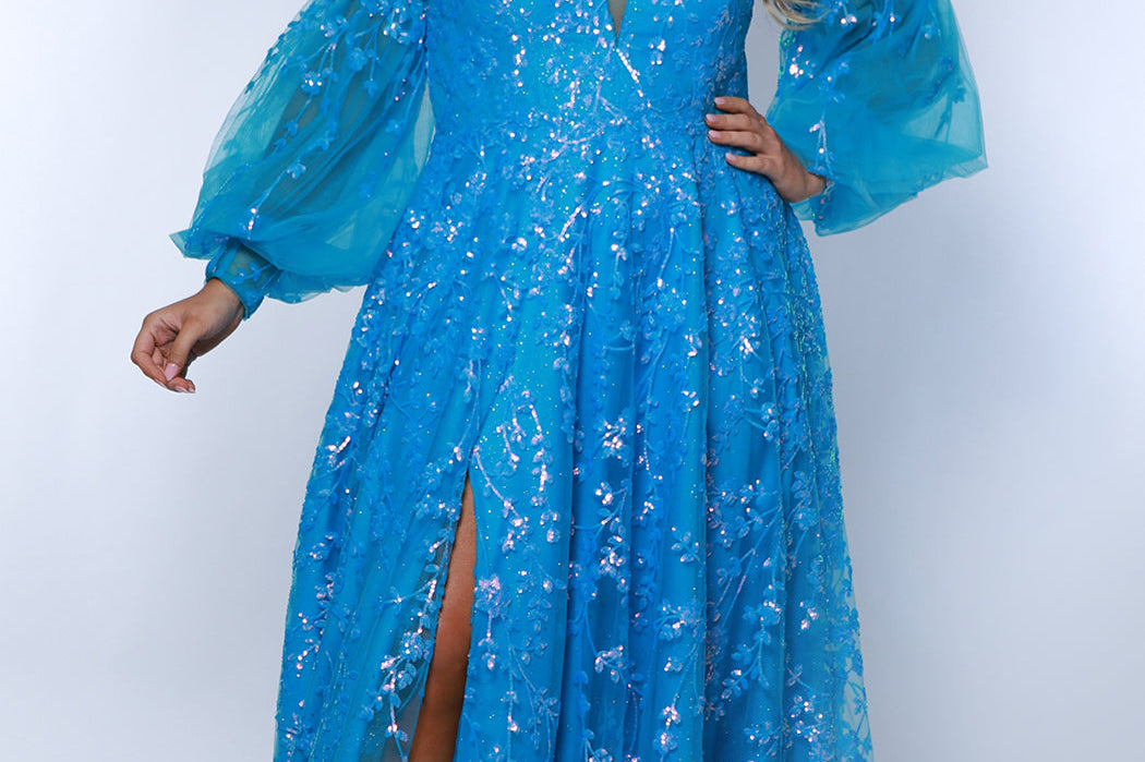 Tease Prom TE2433 blue, Plus size A-line dress with iridescent blue sequins, v-neck, sequin covered straps, slit, bicep to wrist puff sleeves.