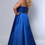 Best selling Tease Prom TE2437 plus size, A-line prom dress with double spaghetti straps, V-neckline, lace bodice and satin skirt with pockets and slit. Available in purple, blue, black, red, or green. 