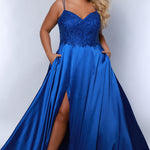 Best selling Tease Prom TE2437 plus size, A-line prom dress with double spaghetti straps, V-neckline, lace bodice and satin skirt with pockets and slit. Available in purple, blue, black, red, or green. 