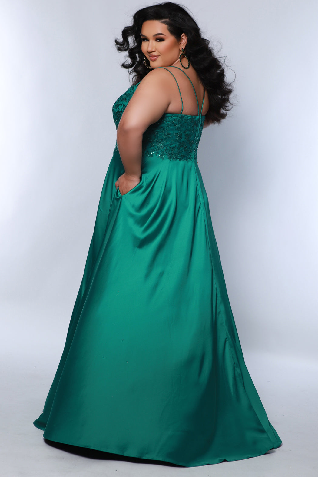 Best selling Tease Prom TE2437 plus size, A-line prom dress with double spaghetti straps, V-neckline, lace bodice and satin skirt with pockets and slit. Available in purple, blue, black, red, or green. 