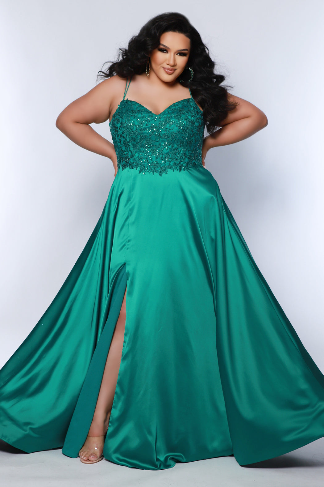Best selling Tease Prom TE2437 plus size, A-line prom dress with double spaghetti straps, V-neckline, lace bodice and satin skirt with pockets and slit. Available in purple, blue, black, red, or green. 