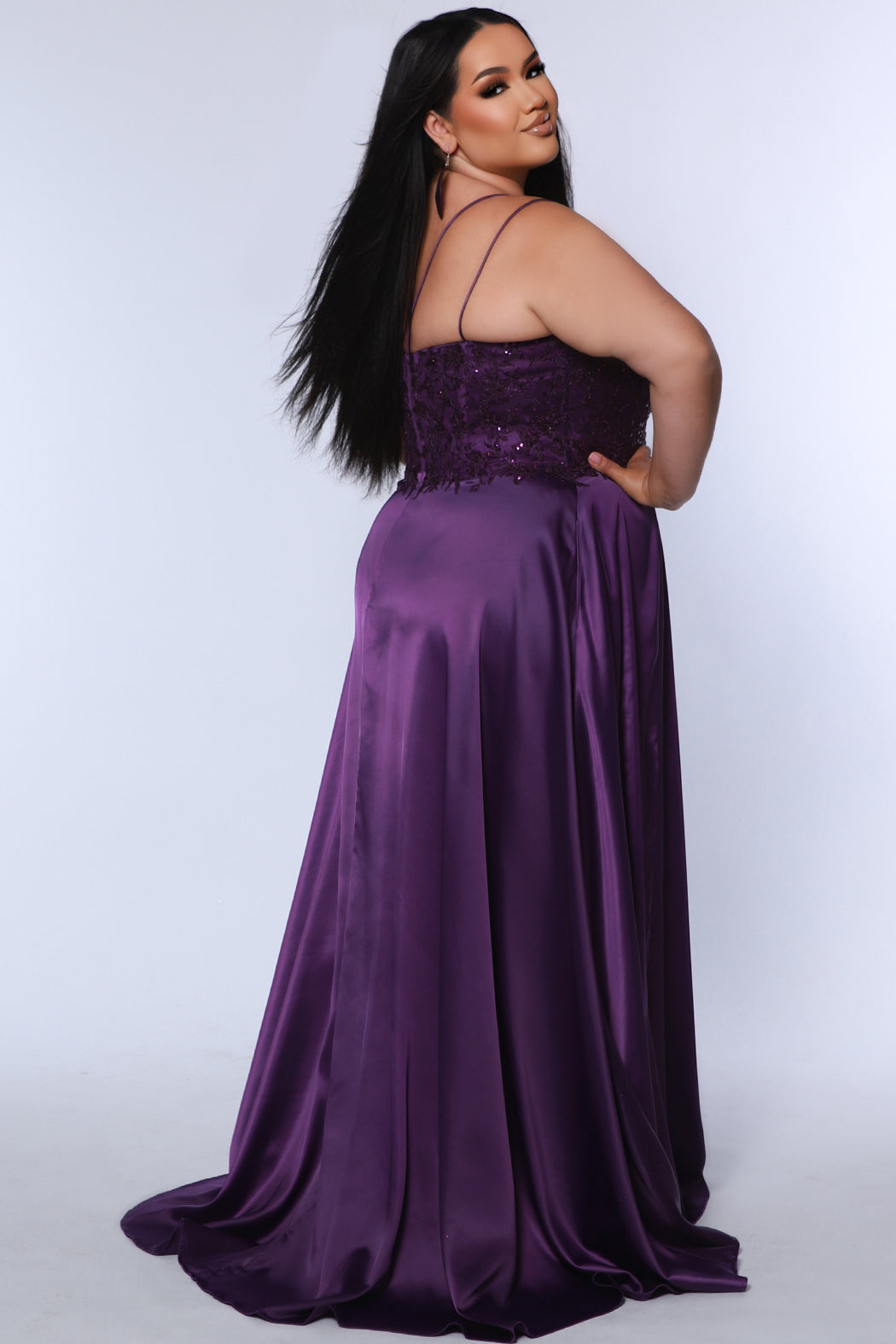 Best selling Tease Prom TE2437 plus size, A-line prom dress with double spaghetti straps, V-neckline, lace bodice and satin skirt with pockets and slit. Available in purple, blue, black, red, or green. 