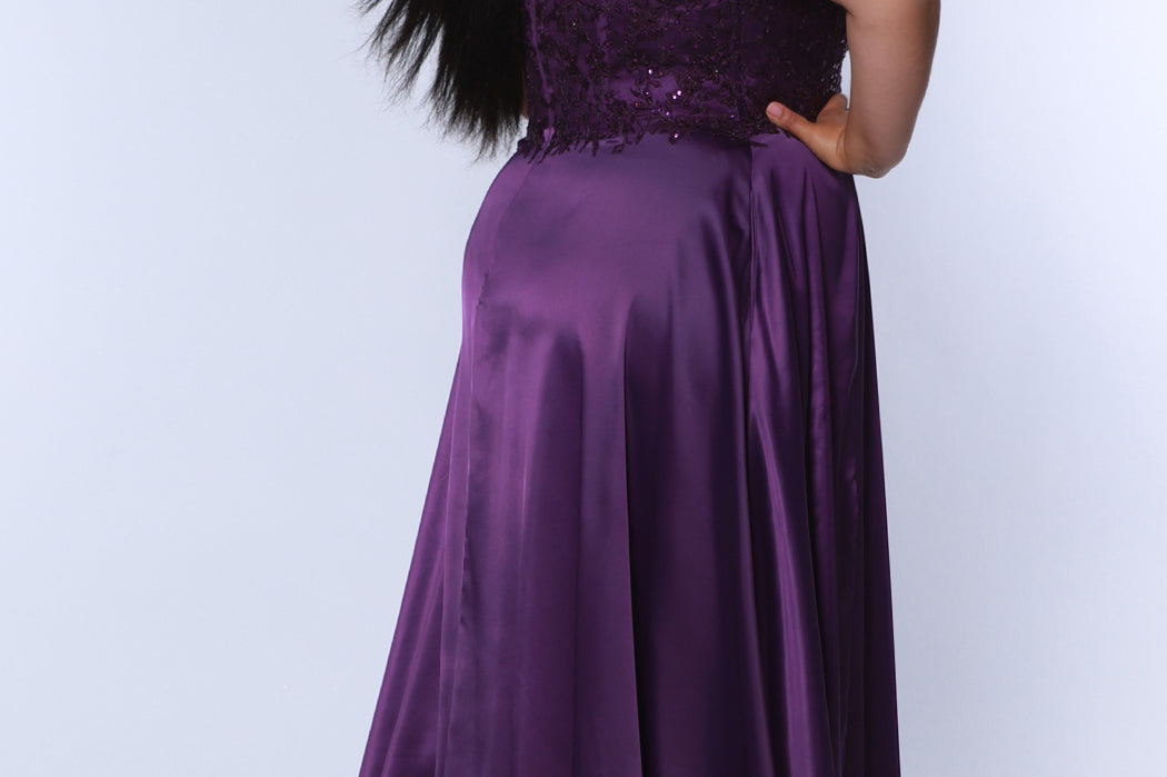 Best selling Tease Prom TE2437 plus size, A-line prom dress with double spaghetti straps, V-neckline, lace bodice and satin skirt with pockets and slit. Available in purple, blue, black, red, or green. 