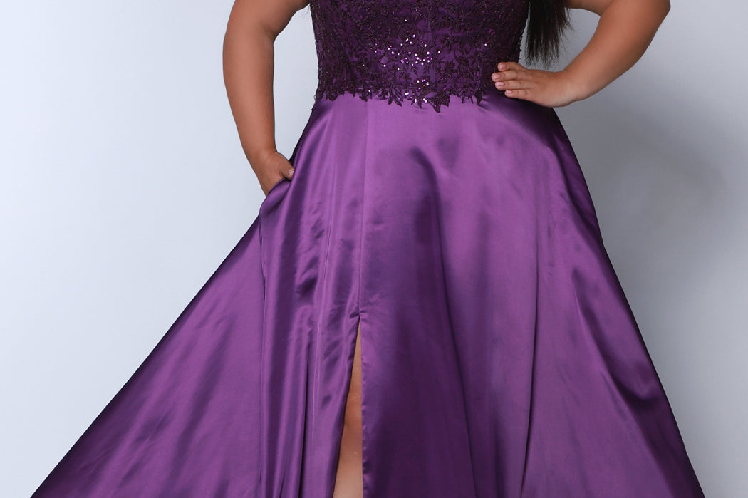 Best selling Tease Prom TE2437 plus size, A-line prom dress with double spaghetti straps, V-neckline, lace bodice and satin skirt with pockets and slit. Available in purple, blue, black, red, or green. 