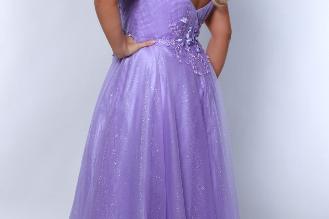 Tease Prom TE2441 Purple. A-line silhouette, Leaf embroidered applique with cut glass beads, sparkle tulle, Deep V-neckline, Sparkle tulle tone-on-tone mesh insert, Pleated front and back bodice, Spaghetti straps, V-back, Long invisible center back zipper, Natural waistline, A-line skirt.