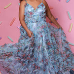 Plus size 3D floral print A-line prom dress.  V-neckline with spaghetti straps, mesh insert and pleated bodice. A-line skirt with pockets. Availablit in light blue, hot pink, royal blue and lilac in sizes 14-32. Style TE2508 from Tease Prom.