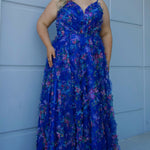 Plus size 3D floral print A-line prom dress.  V-neckline with spaghetti straps, mesh insert and pleated bodice. A-line skirt with pockets. Availablit in light blue, hot pink, royal blue and lilac in sizes 14-32. Style TE2508 from Tease Prom.