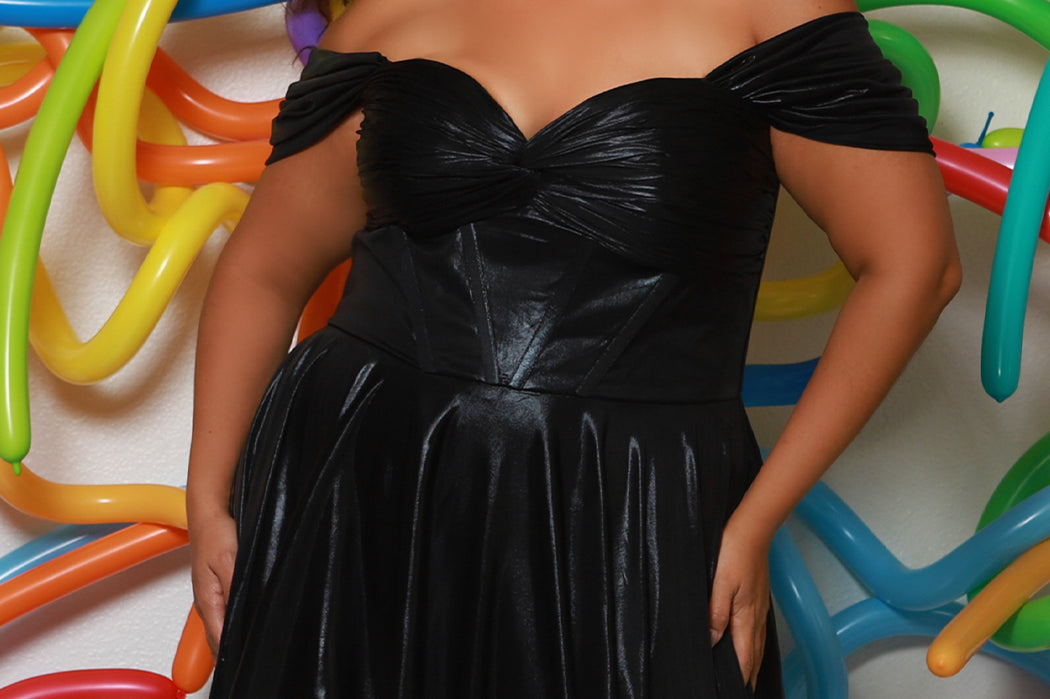 Plus size metallic tiered prom dress.  Strapless bodice with pleating and exposed boning. Detachable pleated drape sleeves. Available in fuchsia pink, indigo dark blue and onyx black. Style TE2510 by Tease Prom.