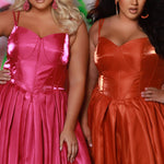 Plus size A-line prom gown with double spaghetti straps, exposed corset bodning on basque waisltine. Full A-line skirt with box pleates and pockets. Tease Prom style TE2518 avaiable in berry pink or sunset orange in sizes 14-32. 