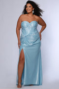 Sexy fitted pastel plus size prom dress by Tease Prom. Style TE2528. Strapless  bodice with asymmetrical basque waistline. Exposed corset boning and bustier bodice is fully lined.  Ruching and knot detail at the waistline and high slit with sweep train on a fitted skirt.  Tease Prom style TE2528 is available in lavender purple or sky blue in plus sizes 14-24.
