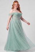 Teen wearing an A-line tulle prom gown with pearl and hot fix beaded details on a white background.

TE2604 in sage green by Tease Prom, exclusively plus size prom dresses designed by Sydney's Closet.