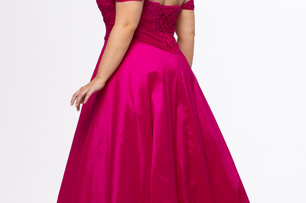 Tease Prom style TE2615 in Magenta. 

Strapless taffeta plus size A-line gown. Lace covered sweetheart bodice with ruched basque waist.  Off-the-shoulder lace covered straps, lace up back and pockets. Available in sizes 14-32. 