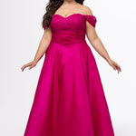 Tease Prom style TE2615 in Magenta. 

Strapless taffeta plus size A-line gown. Lace covered sweetheart bodice with ruched basque waist.  Off-the-shoulder lace covered straps, lace up back and pockets. Available in sizes 14-32. 