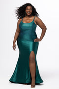 Tease Prom style TE2627 in Emerald green. 

Fitted plus size gown with Stretch satin, Scoop neckline, Straps and a Natural waistline. A ruched bum and left leg slit. lace up back with modesty panel. Horsehair hem and sweep train. Available in sizes 14-24 in Lipstick pink, Emerald green and Navy blue. 