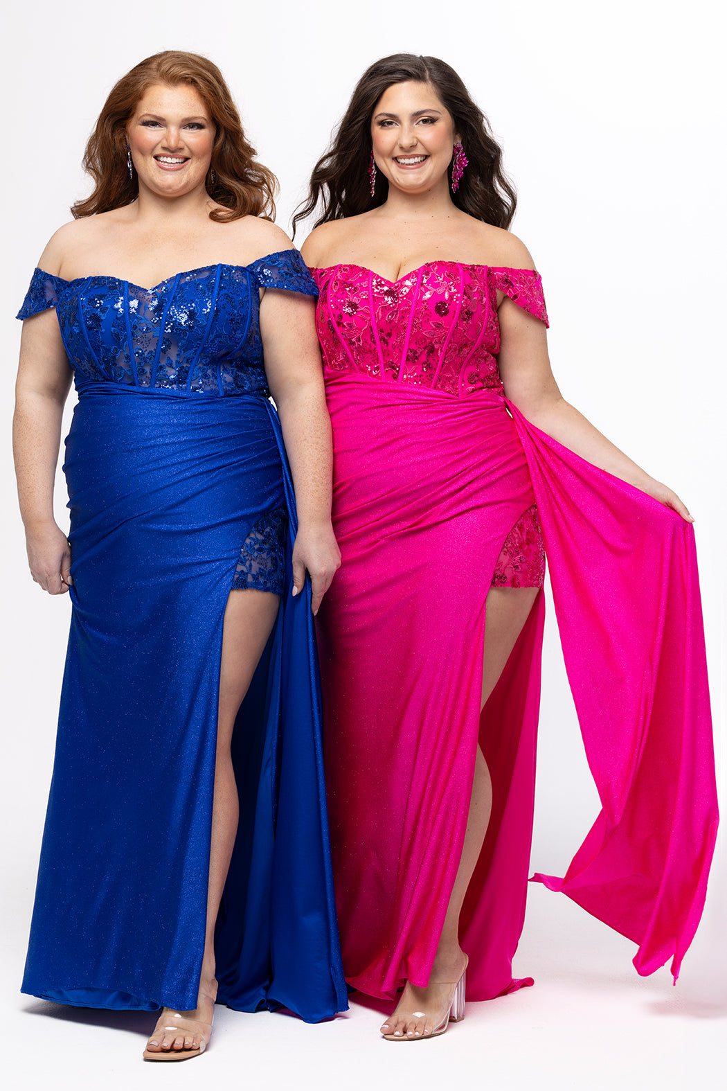 Tease Prom style TE2629 in Sapphire blue and pink. 

Slim fitted plus size gown. Sweetheart neckline, Exposed corset boning, Natural waistline on front, basque waistline at back. Ruched skirt, Left leg slit with appliqués on net, Drape flyaway on waist. Detachable lace covered drape straps. Lace up back with modesty panel. Available in Blue, pink, red and black sizes 14-24. 