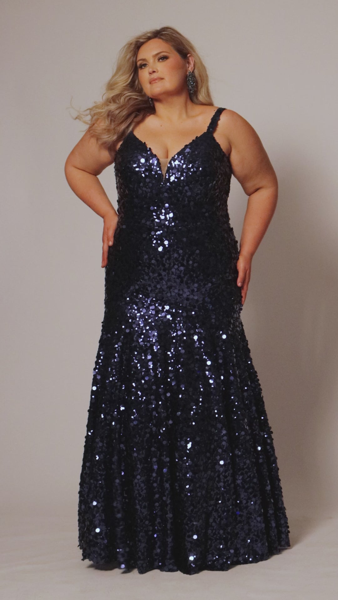 Fitted mermaid plus size prom dress.  Sequin and piette fabric with stretch knit linight. Deep v-neckline with nude mesh insert and spaghetti straps. Mermaid fitted skirt. Available in midnight navy blue and hot magenta pink. TE2512 by Tease Prom. 