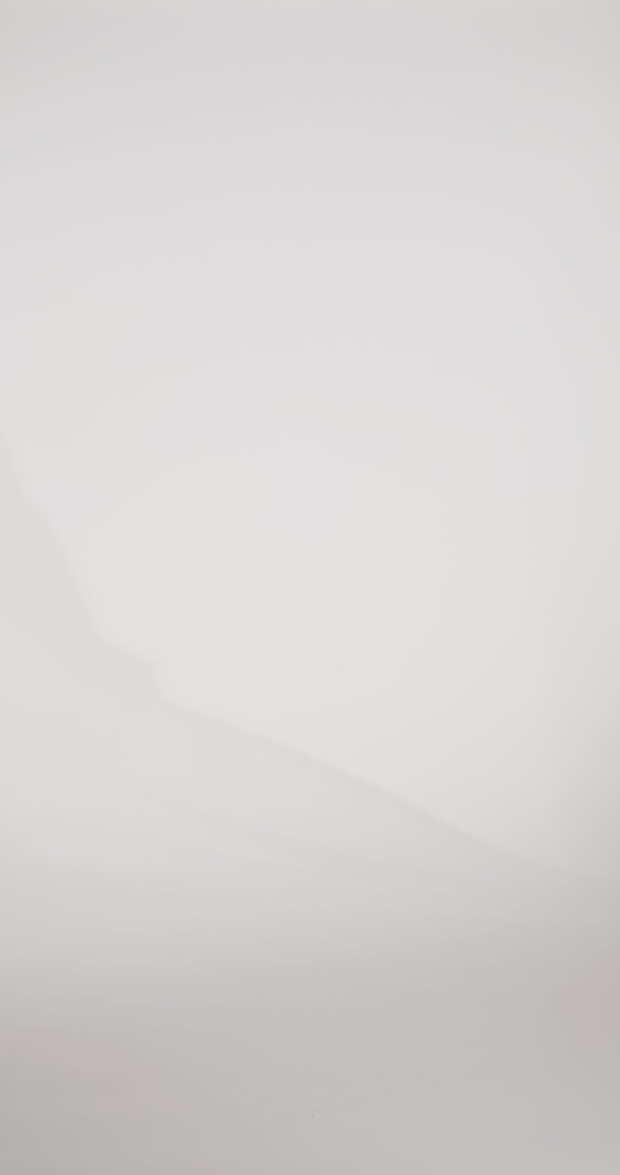 Woman models a slim, off-the-shoulder animal print dress, first with a long cape and then without, showing the front and back before walking off screen.