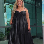 Empire plus size formal dress with spaghetti straps, pleated bodice with knot detail, pockets and slit. Available in gold, onyx black and ruby red. SC7414 by Sydney's Closet