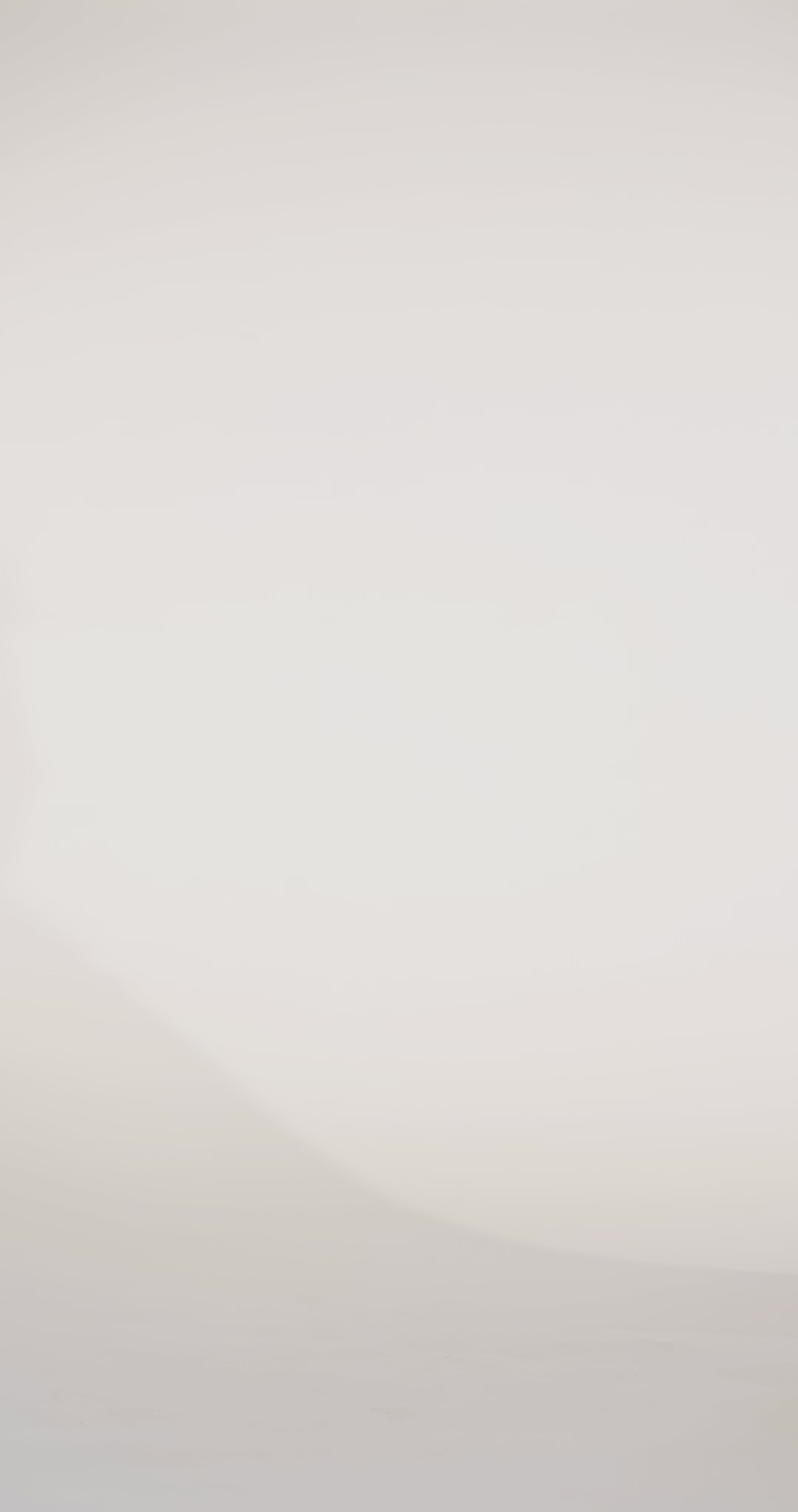 Woman models a pink off-the-shoulder slim dress with a high slit, draped panel, and lace and sparkle detailing on the bodice, waving the drape panel and turning to show the lace-up back before walking off screen.