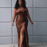 Simple plus size satin slim a-line fitted dress.  Spaghetti straps, pleated bodice, exposed boning corset with basque waistline.  Slim, fitted skirt with ruching. Lace-up back with modesty panel and sweep train.  Available in cherry red, chocolate brown, hunter green and onyx black. Sydney's Closet plus size style SC7426.