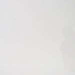 Woman models a black sequin A-line dress with a V-neckline and flowing cape sleeves, turning to show the back before walking off screen.